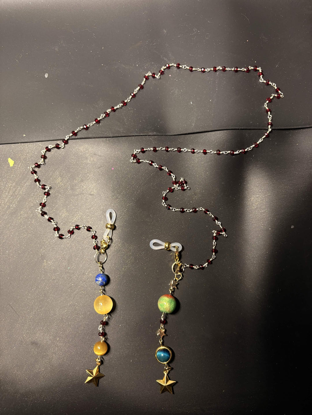 PHM Glasses chain