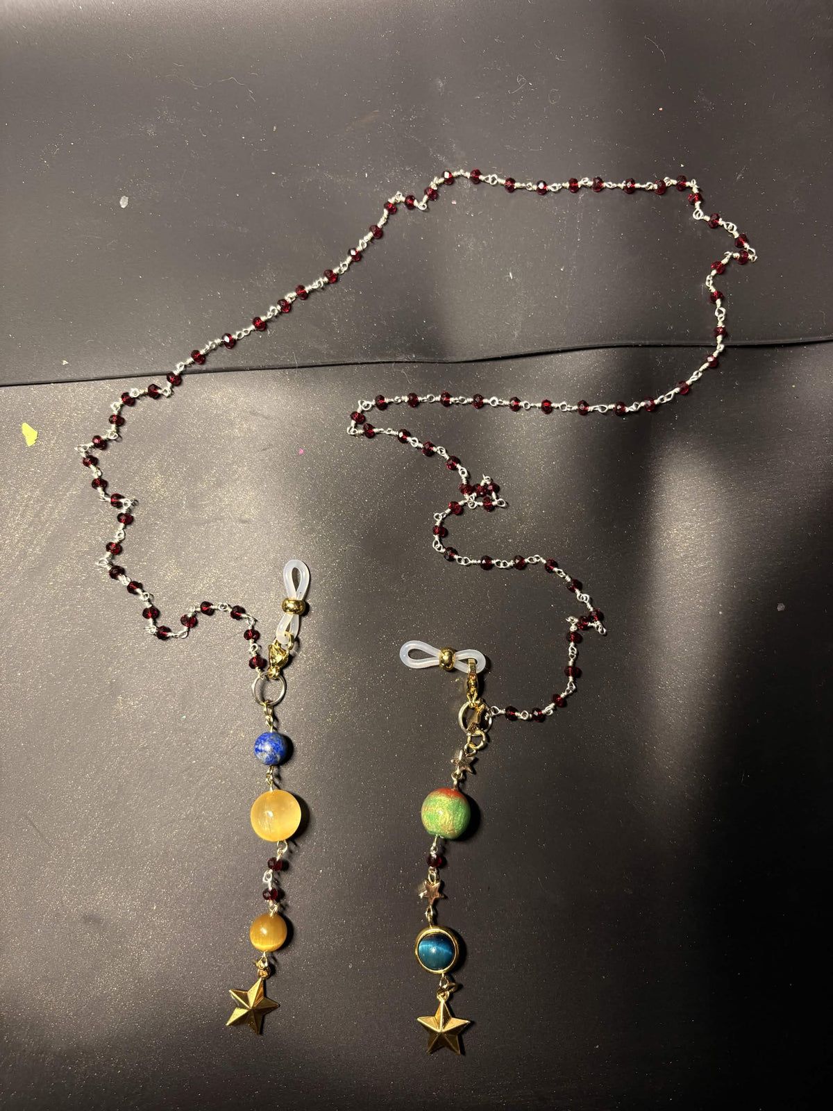 PHM Glasses chain